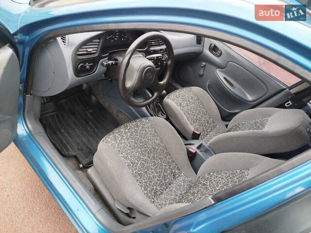 Синій Деу Ланос, об'ємом двигуна 1.5 л та пробігом 126 тис. км за 2900 $, фото 10 на Automoto.ua