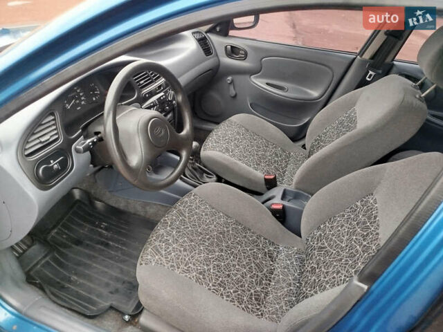 Синий Дэу Ланос, объемом двигателя 1.5 л и пробегом 126 тыс. км за 2750 $, фото 9 на Automoto.ua