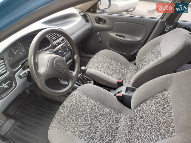 Синий Дэу Ланос, объемом двигателя 1.5 л и пробегом 126 тыс. км за 2900 $, фото 6 на Automoto.ua