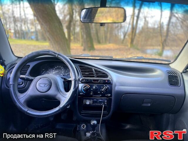 Синий Дэу Ланос, объемом двигателя 1.5 л и пробегом 375 тыс. км за 1750 $, фото 6 на Automoto.ua
