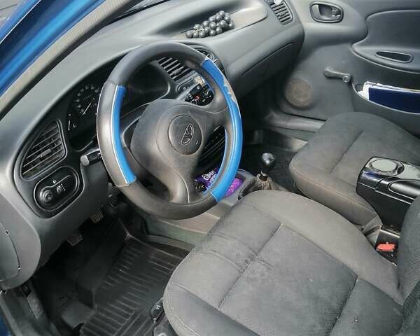 Синий Дэу Ланос, объемом двигателя 1.5 л и пробегом 380 тыс. км за 1900 $, фото 1 на Automoto.ua