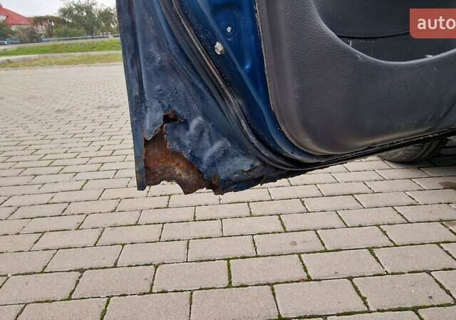 Синій Деу Ланос, об'ємом двигуна 1.5 л та пробігом 560 тис. км за 1100 $, фото 13 на Automoto.ua