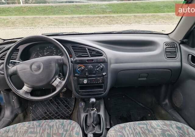 Синій Деу Ланос, об'ємом двигуна 1.5 л та пробігом 560 тис. км за 1100 $, фото 6 на Automoto.ua