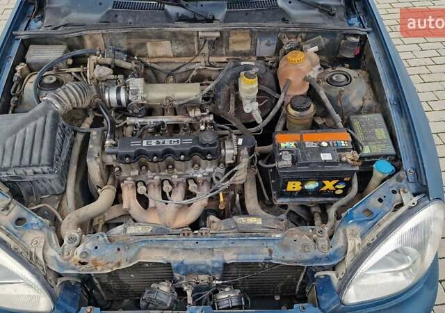 Синій Деу Ланос, об'ємом двигуна 1.5 л та пробігом 560 тис. км за 1100 $, фото 12 на Automoto.ua