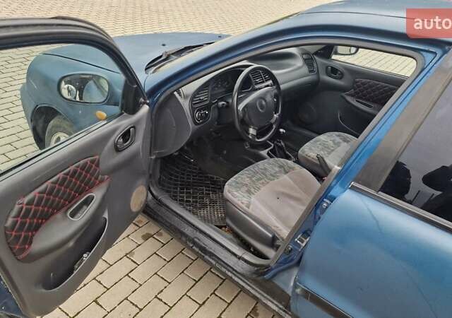Синій Деу Ланос, об'ємом двигуна 1.5 л та пробігом 560 тис. км за 1100 $, фото 4 на Automoto.ua