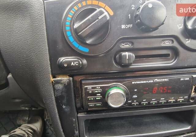 Синій Деу Ланос, об'ємом двигуна 1.5 л та пробігом 560 тис. км за 1100 $, фото 14 на Automoto.ua