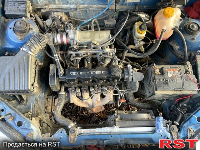 Синий Дэу Ланос, объемом двигателя 1.5 л и пробегом 375 тыс. км за 1750 $, фото 10 на Automoto.ua