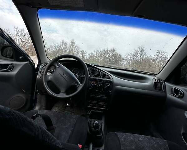 Синий Дэу Ланос, объемом двигателя 1.6 л и пробегом 300 тыс. км за 1800 $, фото 10 на Automoto.ua