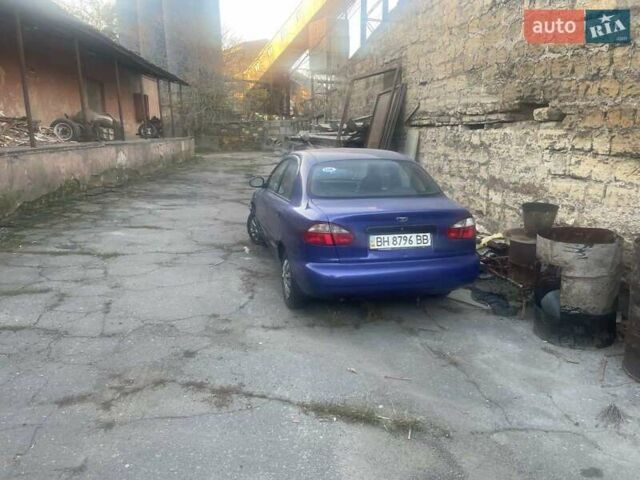 Синий Дэу Ланос, объемом двигателя 1.5 л и пробегом 315 тыс. км за 1300 $, фото 5 на Automoto.ua