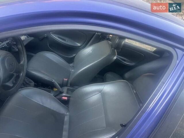 Синий Дэу Ланос, объемом двигателя 1.5 л и пробегом 315 тыс. км за 1300 $, фото 7 на Automoto.ua