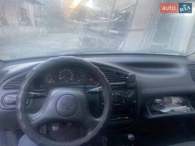 Синий Дэу Ланос, объемом двигателя 1.5 л и пробегом 315 тыс. км за 1300 $, фото 9 на Automoto.ua