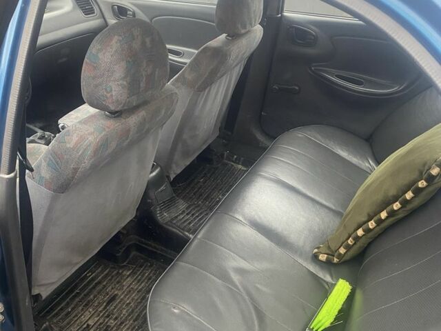 Синий Дэу Ланос, объемом двигателя 1.5 л и пробегом 324 тыс. км за 1200 $, фото 5 на Automoto.ua