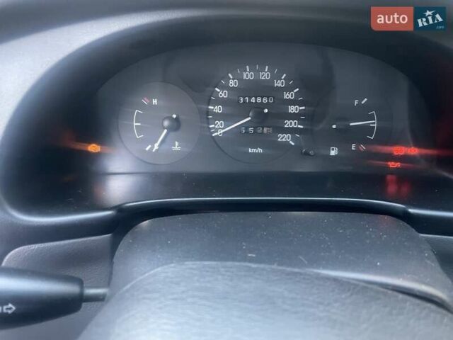 Синий Дэу Ланос, объемом двигателя 1.5 л и пробегом 315 тыс. км за 1300 $, фото 8 на Automoto.ua