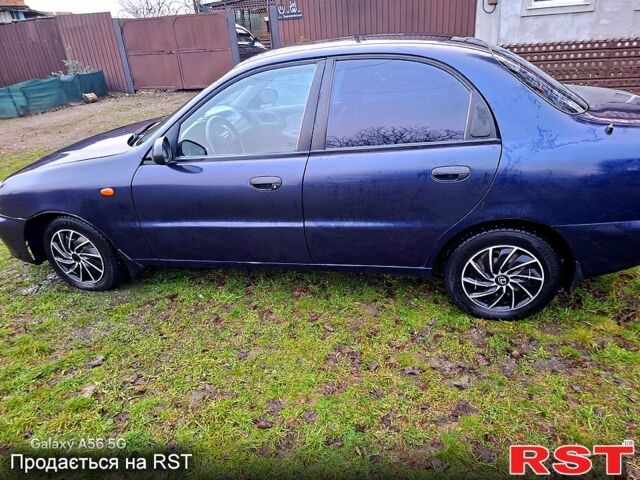 Синий Дэу Ланос, объемом двигателя 1.5 л и пробегом 214 тыс. км за 2000 $, фото 3 на Automoto.ua