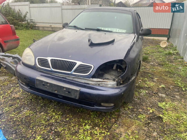 Синий Дэу Ланос, объемом двигателя 1.6 л и пробегом 250 тыс. км за 890 $, фото 32 на Automoto.ua