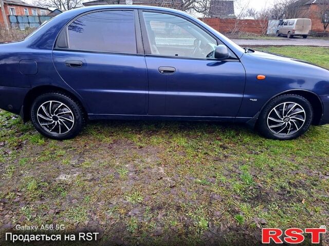 Синий Дэу Ланос, объемом двигателя 1.5 л и пробегом 214 тыс. км за 2000 $, фото 2 на Automoto.ua