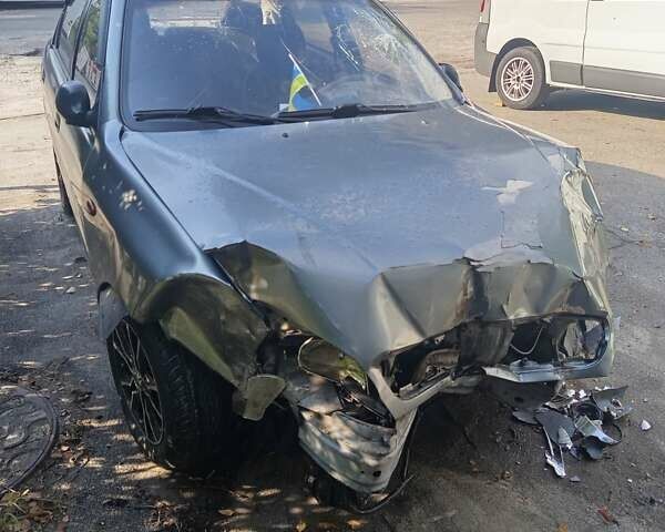 Синій Деу Ланос, об'ємом двигуна 1.5 л та пробігом 326 тис. км за 700 $, фото 3 на Automoto.ua