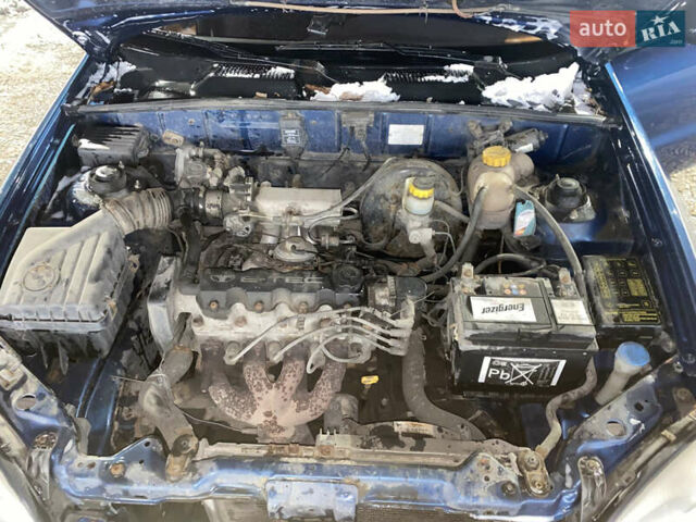 Синій Деу Ланос, об'ємом двигуна 1.35 л та пробігом 325 тис. км за 1300 $, фото 13 на Automoto.ua
