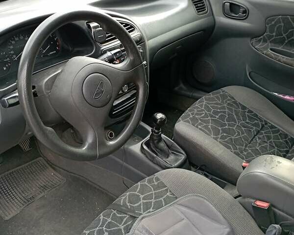 Синий Дэу Ланос, объемом двигателя 1.5 л и пробегом 297 тыс. км за 3200 $, фото 11 на Automoto.ua