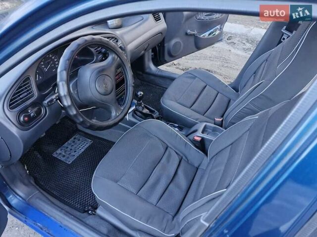 Синій Деу Ланос, об'ємом двигуна 1.5 л та пробігом 227 тис. км за 1800 $, фото 7 на Automoto.ua