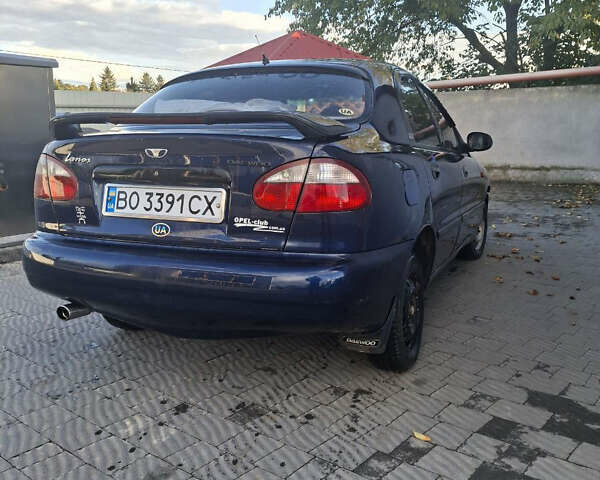 Синий Дэу Ланос, объемом двигателя 1.3 л и пробегом 300 тыс. км за 1300 $, фото 1 на Automoto.ua