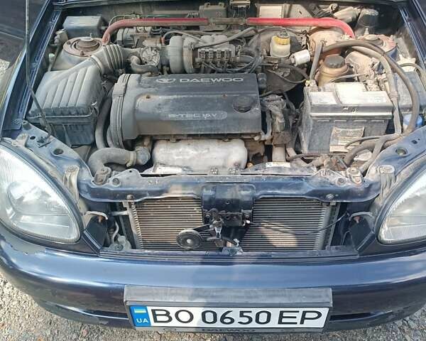 Синій Деу Ланос, об'ємом двигуна 1.6 л та пробігом 236 тис. км за 2200 $, фото 4 на Automoto.ua