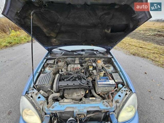 Синій Деу Ланос, об'ємом двигуна 1.6 л та пробігом 371 тис. км за 1800 $, фото 40 на Automoto.ua