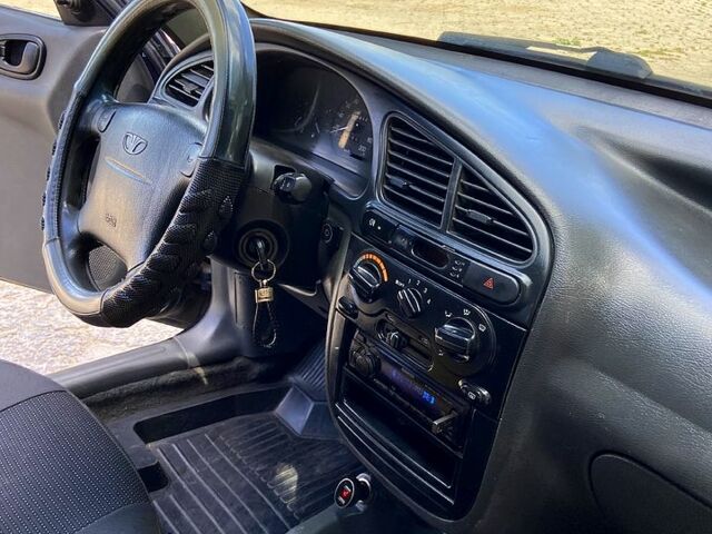 Синий Дэу Ланос, объемом двигателя 1.6 л и пробегом 256 тыс. км за 2300 $, фото 10 на Automoto.ua