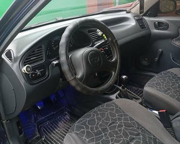 Синий Дэу Ланос, объемом двигателя 1.5 л и пробегом 400 тыс. км за 1550 $, фото 33 на Automoto.ua