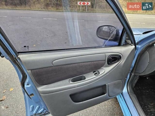 Синій Деу Ланос, об'ємом двигуна 1.6 л та пробігом 371 тис. км за 1800 $, фото 18 на Automoto.ua
