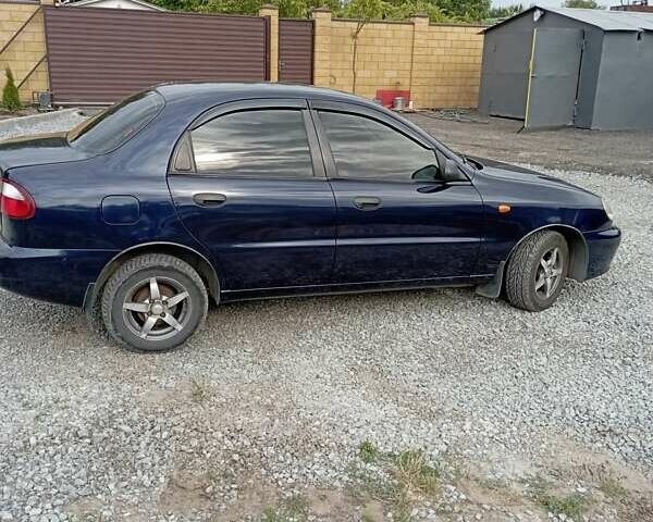 Синий Дэу Ланос, объемом двигателя 1.5 л и пробегом 297 тыс. км за 3200 $, фото 2 на Automoto.ua