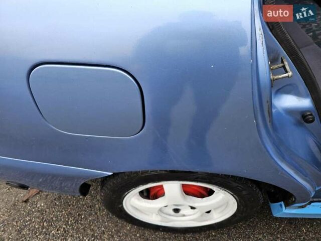 Синій Деу Ланос, об'ємом двигуна 1.6 л та пробігом 371 тис. км за 1800 $, фото 24 на Automoto.ua