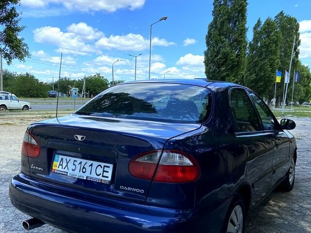 Синий Дэу Ланос, объемом двигателя 1.6 л и пробегом 256 тыс. км за 2300 $, фото 3 на Automoto.ua