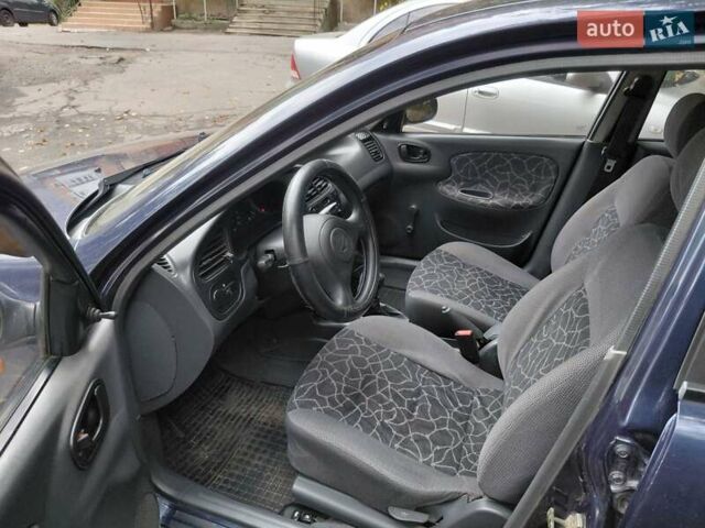 Синий Дэу Ланос, объемом двигателя 1.5 л и пробегом 238 тыс. км за 2050 $, фото 20 на Automoto.ua
