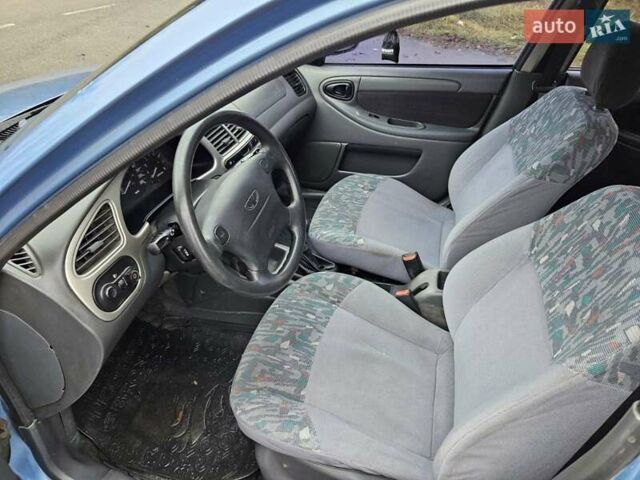 Синій Деу Ланос, об'ємом двигуна 1.6 л та пробігом 371 тис. км за 1800 $, фото 16 на Automoto.ua