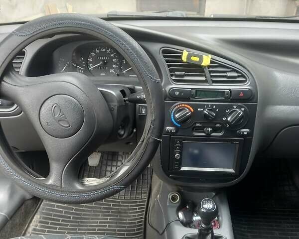 Синій Деу Ланос, об'ємом двигуна 1.5 л та пробігом 270 тис. км за 3000 $, фото 15 на Automoto.ua