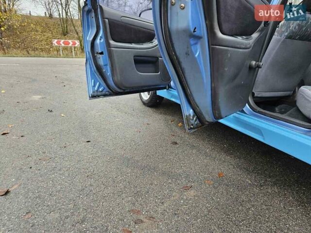 Синій Деу Ланос, об'ємом двигуна 1.6 л та пробігом 371 тис. км за 1800 $, фото 26 на Automoto.ua