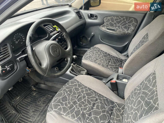 Синій Деу Ланос, об'ємом двигуна 1.5 л та пробігом 300 тис. км за 1500 $, фото 14 на Automoto.ua