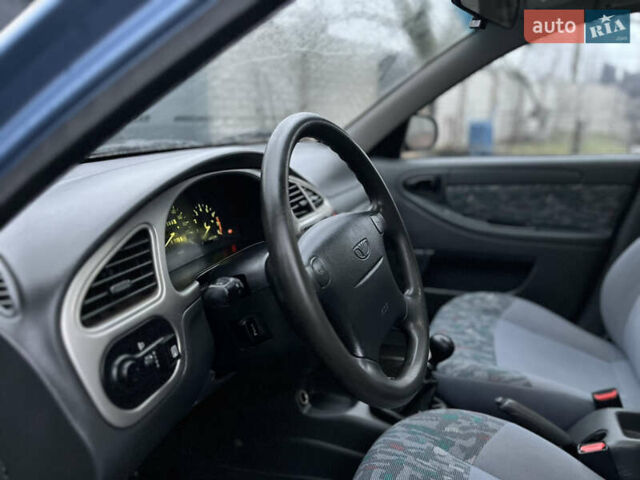 Синий Дэу Ланос, объемом двигателя 1.6 л и пробегом 107 тыс. км за 2999 $, фото 13 на Automoto.ua