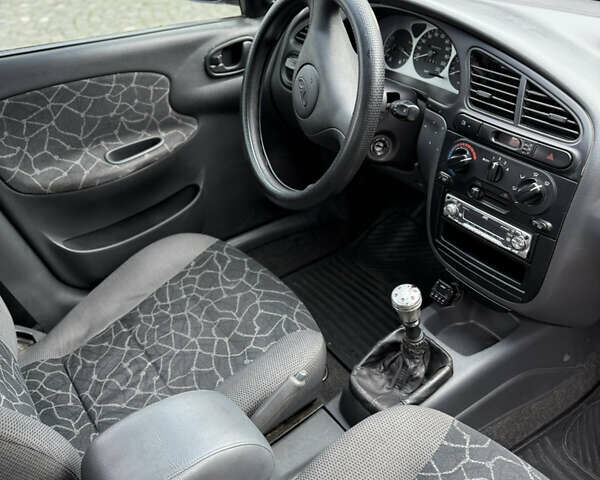 Синий Дэу Ланос, объемом двигателя 1.5 л и пробегом 180 тыс. км за 2500 $, фото 21 на Automoto.ua