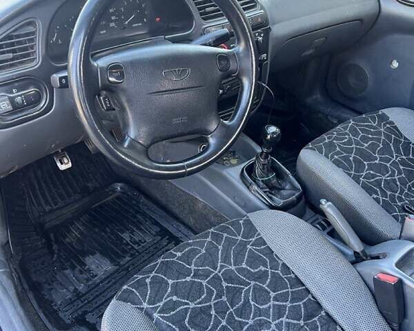 Дэу Ланос 2003 в Черновцах на Automoto.ua Синий Дэу Ланос, объемом двигателя 1.5 л и пробегом 187 тыс. км за 2400 $, фото 1 на Automoto.ua