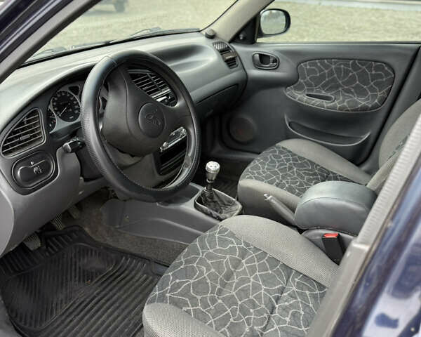 Синий Дэу Ланос, объемом двигателя 1.5 л и пробегом 180 тыс. км за 2500 $, фото 16 на Automoto.ua