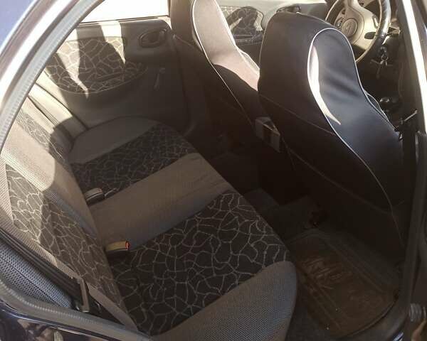 Синий Дэу Ланос, объемом двигателя 1.5 л и пробегом 152 тыс. км за 3000 $, фото 6 на Automoto.ua