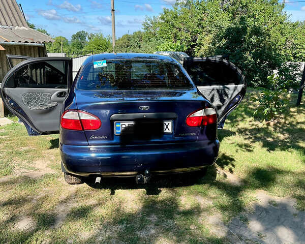 Синий Дэу Ланос, объемом двигателя 1.5 л и пробегом 300 тыс. км за 2244 $, фото 7 на Automoto.ua