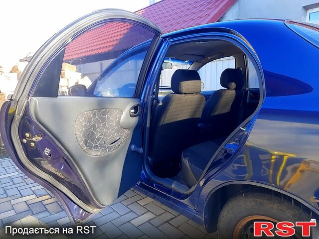 Синий Дэу Ланос, объемом двигателя 1.5 л и пробегом 317 тыс. км за 2200 $, фото 4 на Automoto.ua