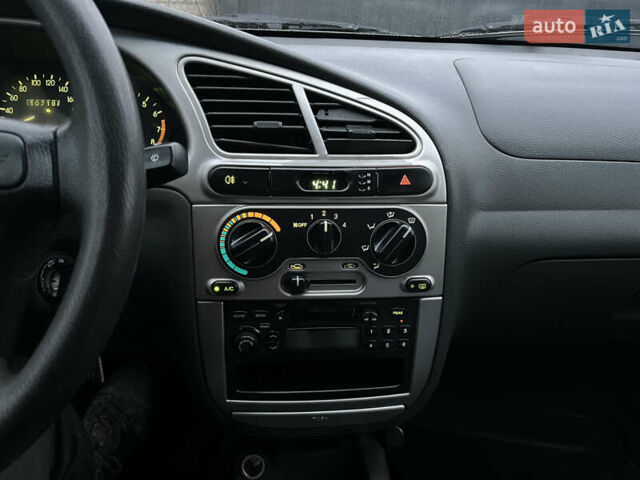 Синий Дэу Ланос, объемом двигателя 1.6 л и пробегом 107 тыс. км за 2999 $, фото 16 на Automoto.ua