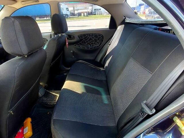 Синий Дэу Ланос, объемом двигателя 1.5 л и пробегом 94 тыс. км за 2800 $, фото 5 на Automoto.ua