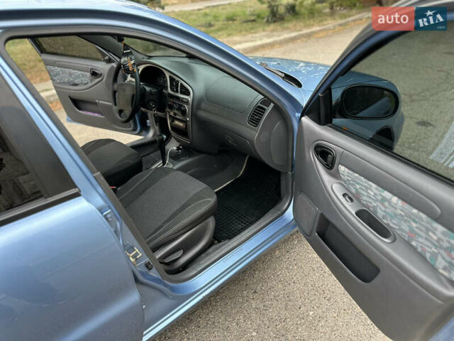 Синій Деу Ланос, об'ємом двигуна 1.6 л та пробігом 115 тис. км за 3500 $, фото 8 на Automoto.ua