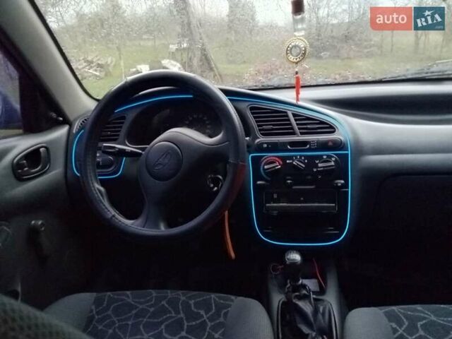 Синий Дэу Ланос, объемом двигателя 1.3 л и пробегом 150 тыс. км за 1650 $, фото 3 на Automoto.ua