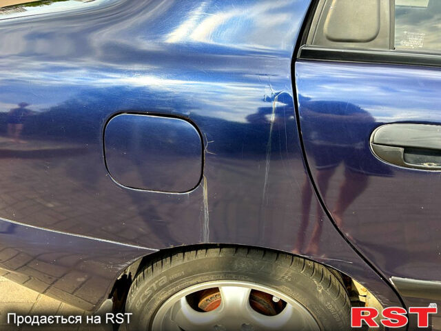 Синій Деу Ланос, об'ємом двигуна 1.5 л та пробігом 173 тис. км за 2700 $, фото 11 на Automoto.ua